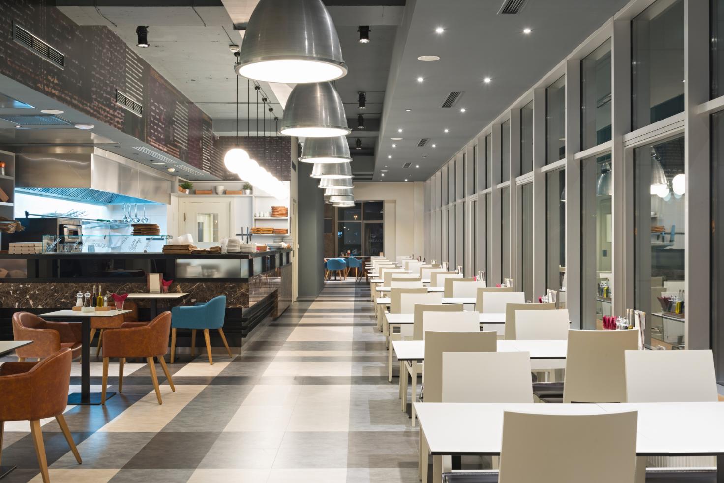 Canteen interior in the evening with overhead lighting